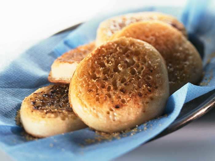  Once warmed up, spongy crumpets are ready to be soaked in butter and jam. 