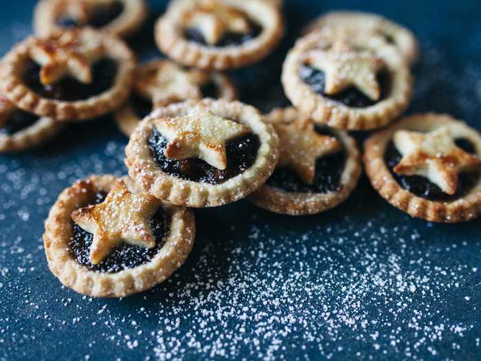 Mince pies are cute, palm-sized pies filled with fruits and nuts. They