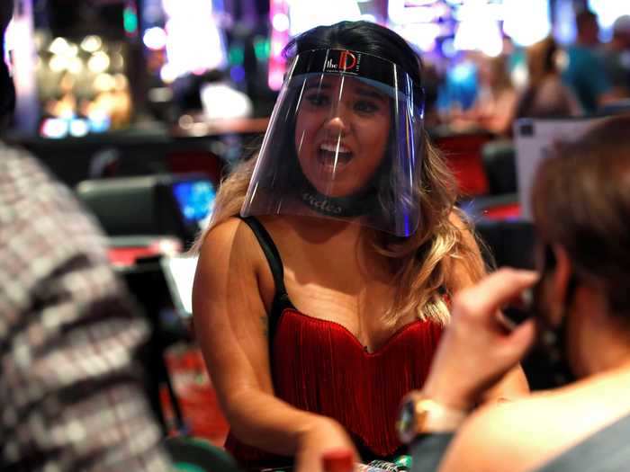 While dealers and dancers at the The D hotel and casino wore face shields ...