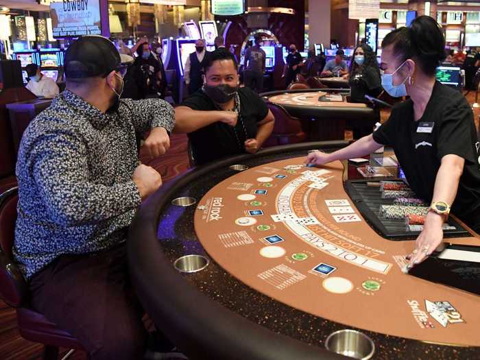 At the Red Rock Resort, blackjack players sat six feet apart and elbow bumped in celebration.