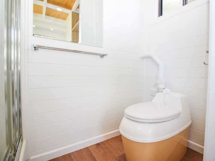 The composting toilet can also be switched out for a cassette or standard toilet.