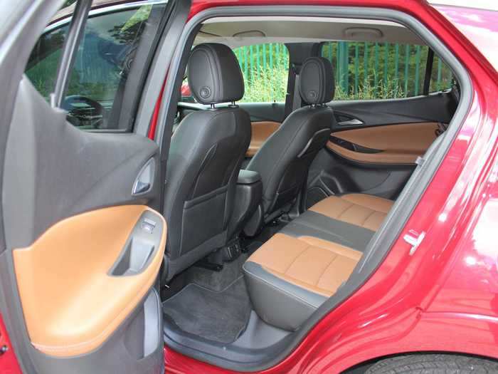 The back seats are a bench design and they echo the color scheme of the front.