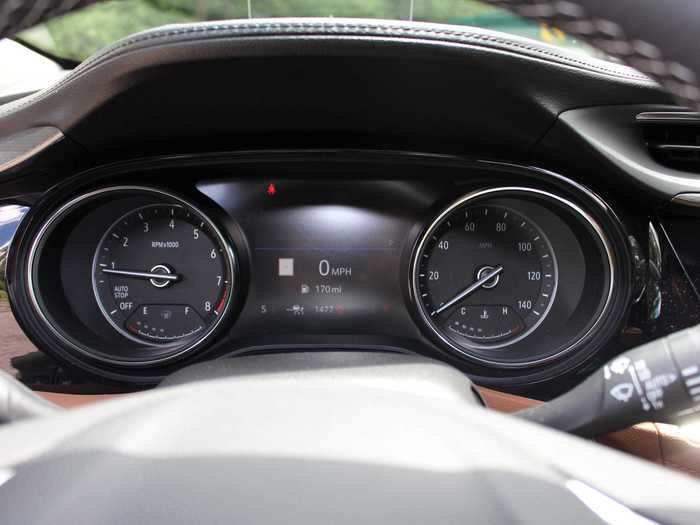 The instrument cluster is a straightforward analog-digital combo.