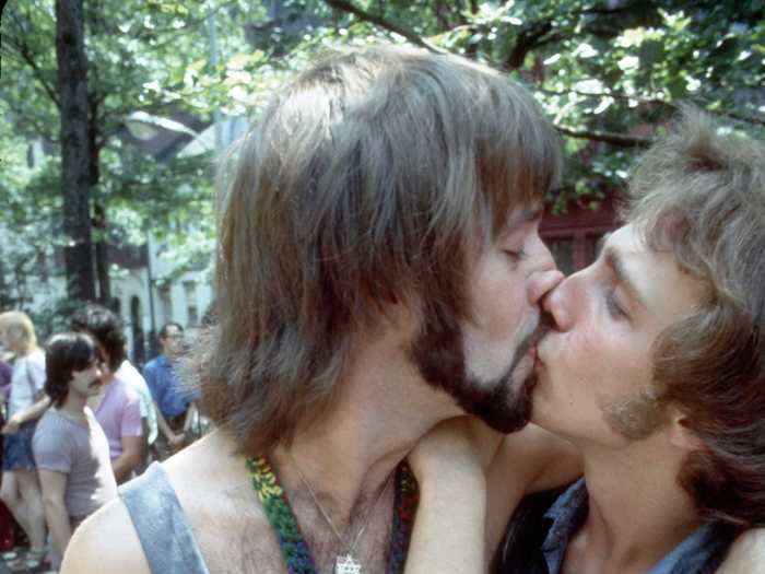 The New York City Pride March dates back 50 years. This couple celebrated the 1971 parade with a kiss.