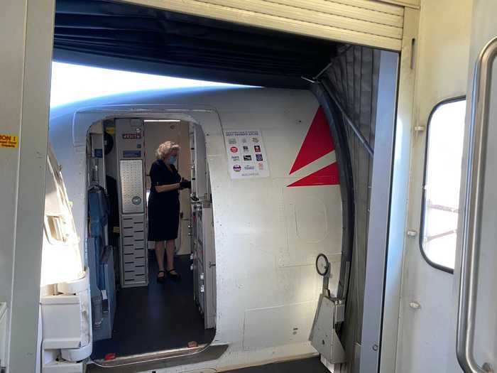 All flight attendants onboard wore masks, which is a Delta requirement since they come into close proximity with passengers.