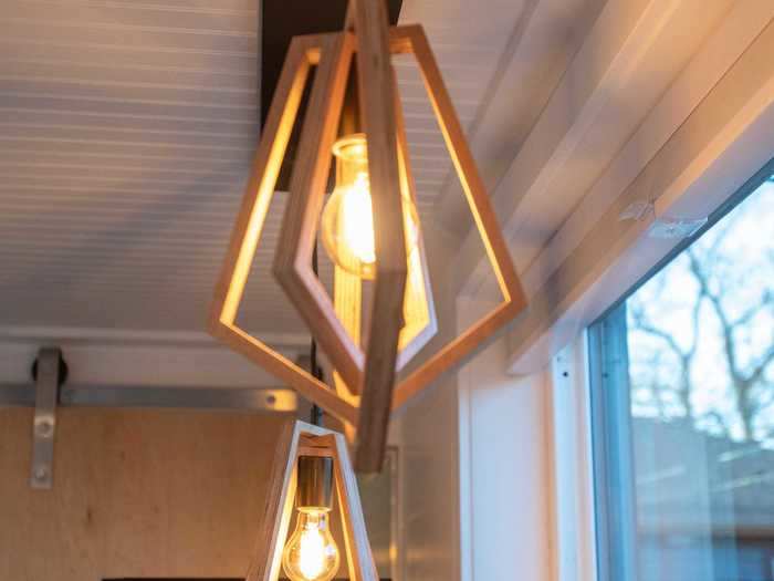 The shipping container home also flush mount and accent lights on the ceiling.