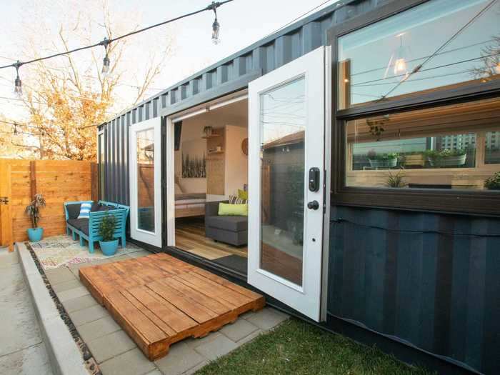 The tiny home also has windows in every room, bringing natural light into an otherwise industrial shipping container.