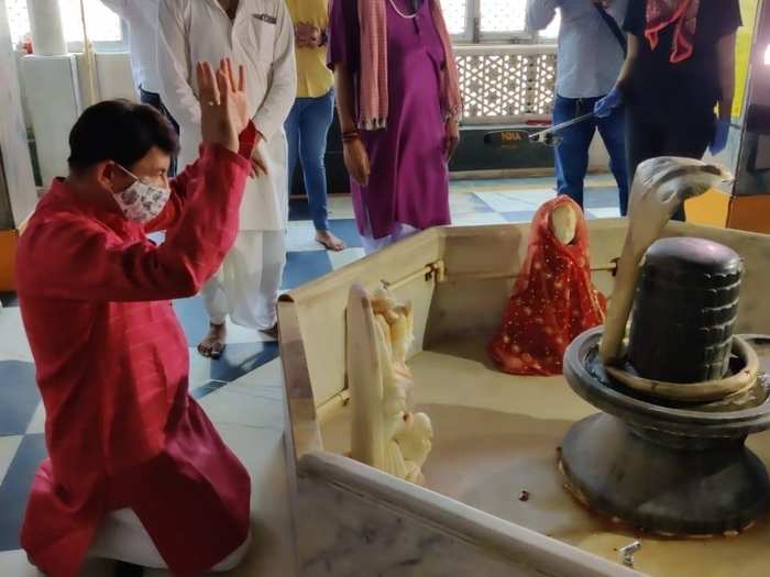 Former Delhi BJP chief Manoj Tiwari was among the first visitors to offer prayer at a temple in New Delhi.