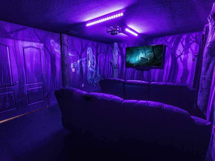 You can also binge all of the films in the Forbidden Forest-themed home theater.