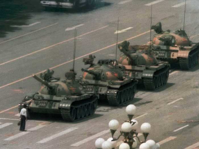 Photographer Jeff Widener captured a lone man standing up to a line of tanks in Tiananmen Square in 1989.