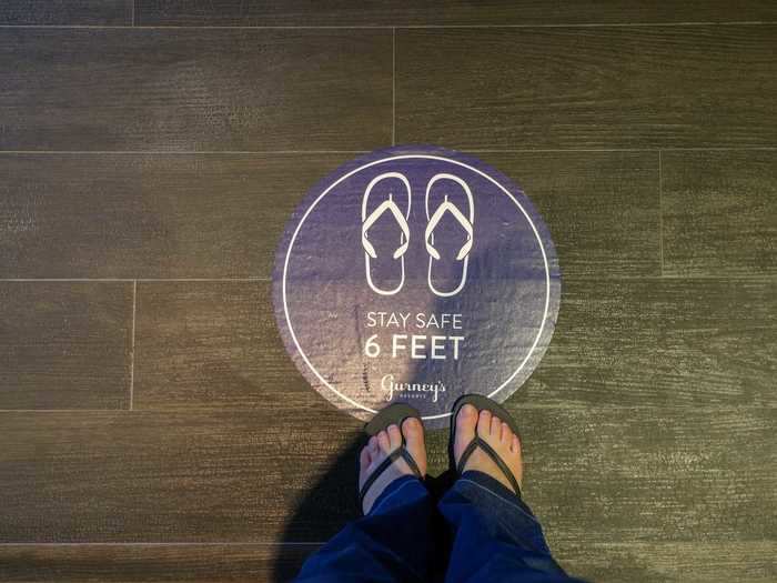 Signage on the floor in the lobby and throughout the resort