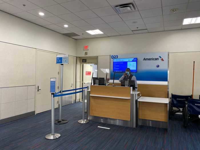 American Airlines had opted to erect partitions at its gates and limit the number of boarding lanes to one.