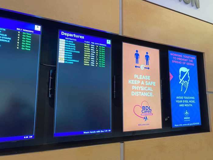 The same orange, white, and blue reminders were displayed throughout the terminal, unavoidable to travelers passing through Bradley