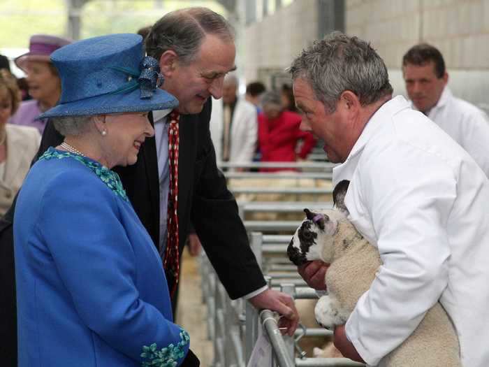 When the Queen meets farmers, she takes the time to meet their farm animals, as well.