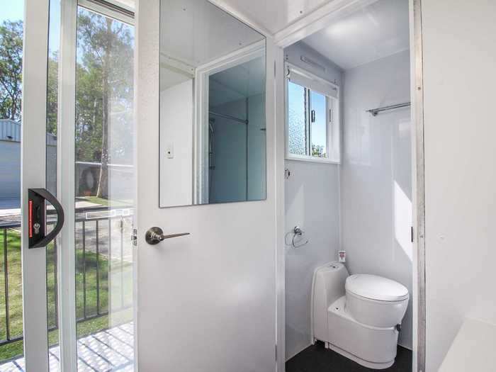 The bathroom inside Aero Tiny includes a cassette toilet, shower, and mirror.