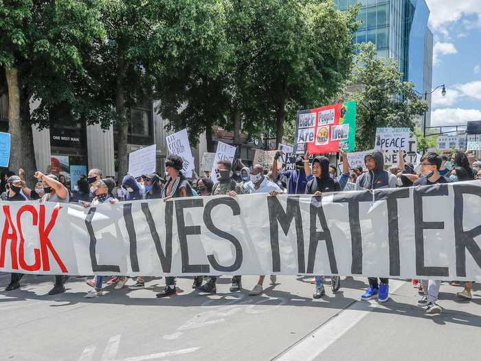 Protesters in Wisconsin carried a massive Black Lives Matter banner as they marched in front of the Capitol building during the week that Floyd was killed.