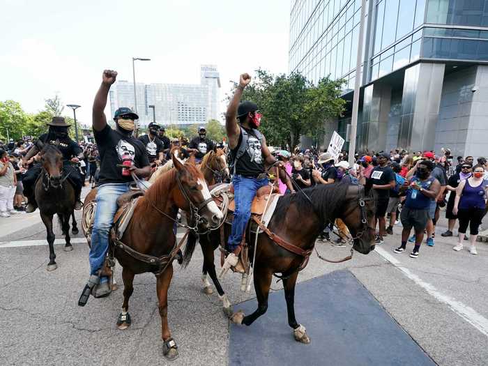 In Houston, Texas, some protesters were captured riding their horses in a march.