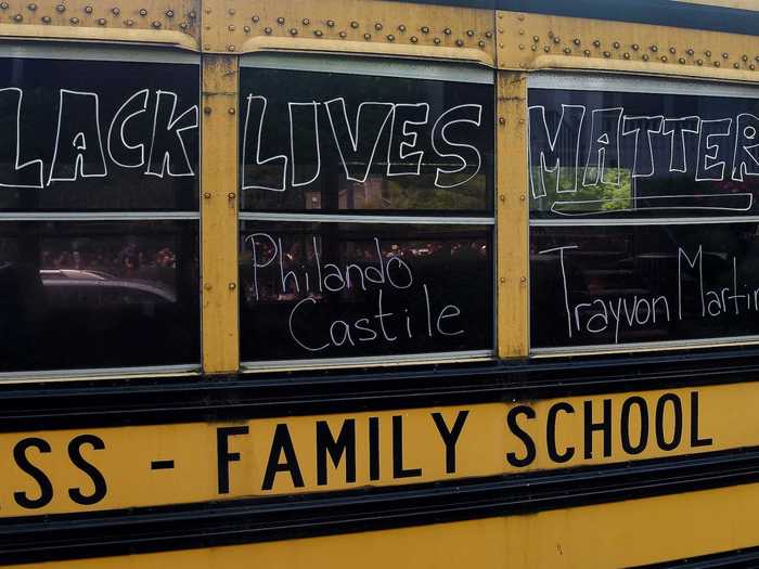 In Bethesda, Maryland, a school bus with the words "Black Lives Matter" and names of victims of police brutality drove past demonstrators.