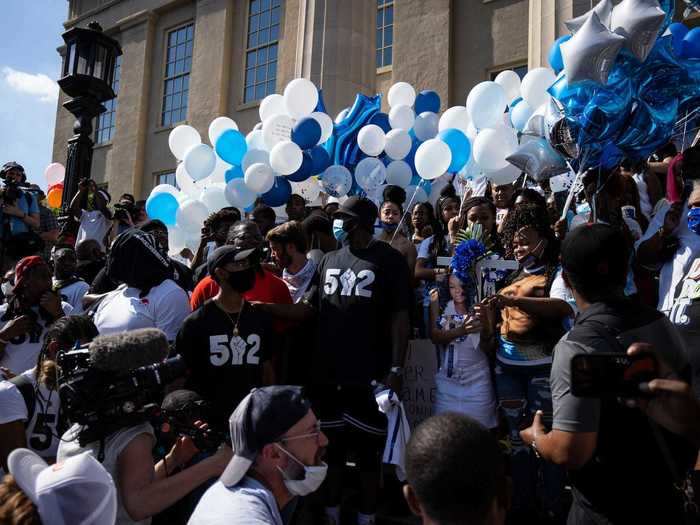 In Louisville, Kentucky, protesters gathered around Tamika Palmer, Breonna Taylor