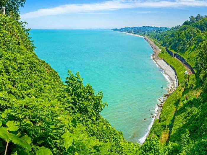 With the Black Sea and its front, and imposing mountain peaks at its back, Batumi