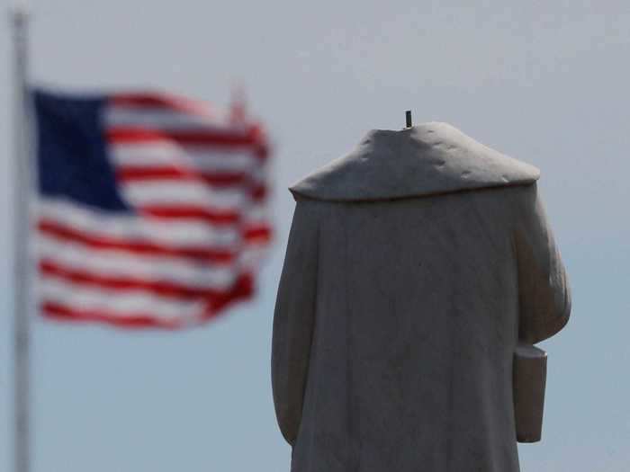 In protests around the US, anti-racist demonstrators have ripped off the heads of Christopher Columbus statues and other colonial American monuments. This photo shows a beheaded statue of Columbus in Boston.