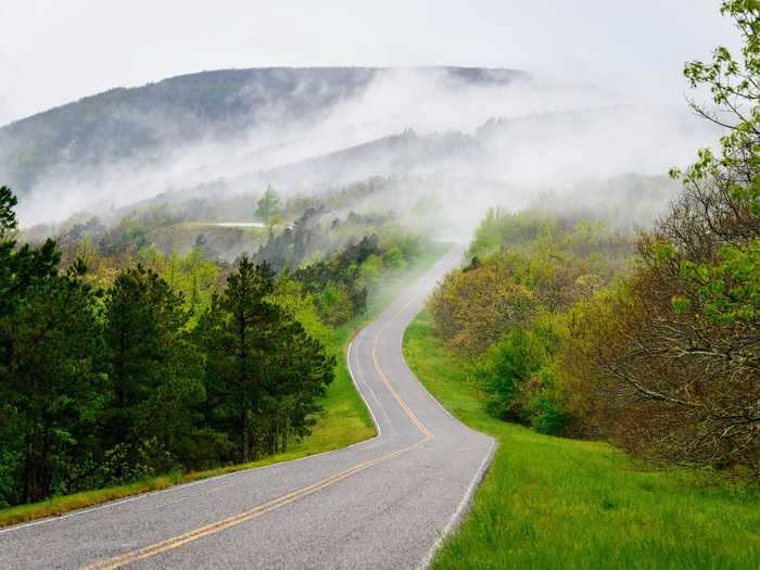 Talimena Scenic Byway runs through mountains in Oklahoma and Arkansas.