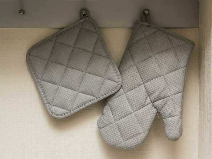 Extra sets of oven mitts tend to just take up space.