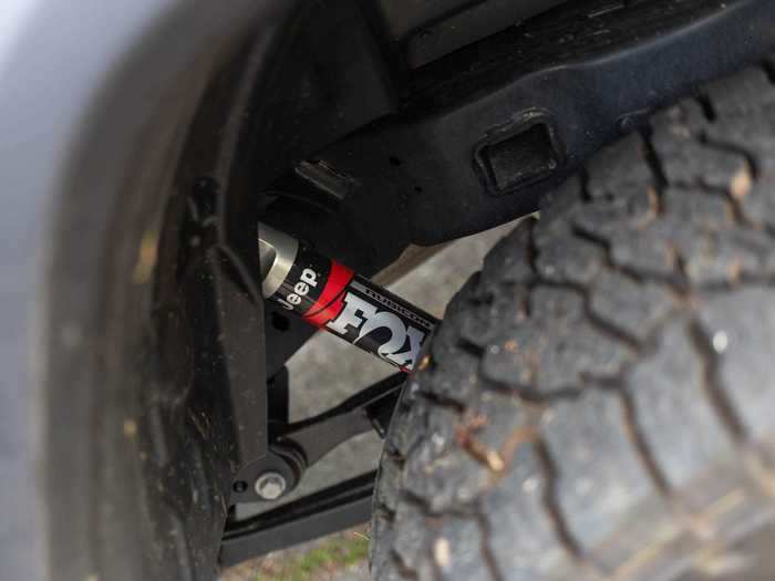 The Fox-branded shock absorbers are clearly visible.
