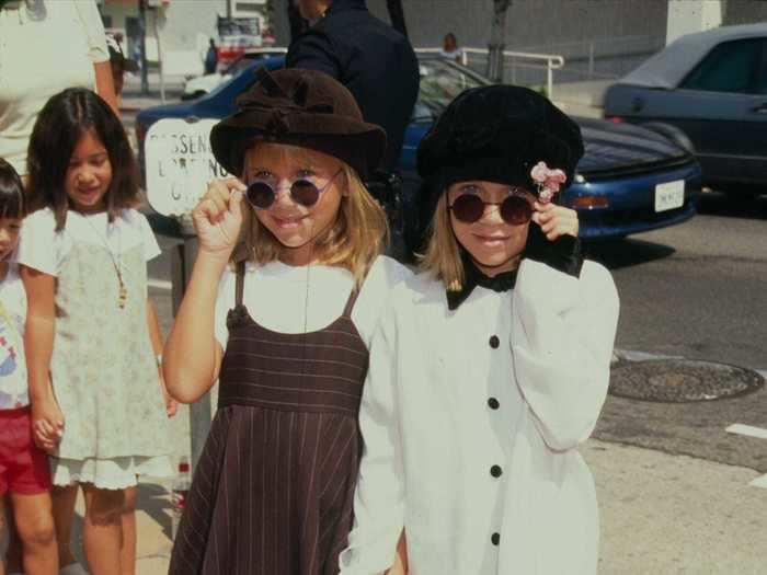 Even as young child stars, the Olsen twins knew how to accessorize.