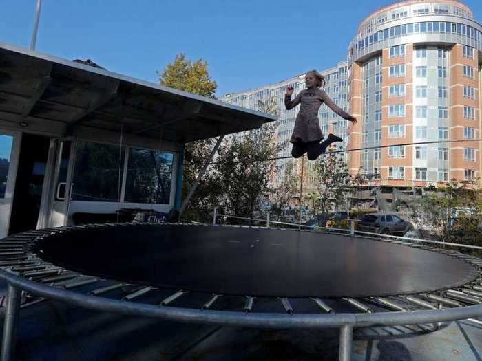 Instead of keeping a garden on the dock, the family has enough space for a trampoline.