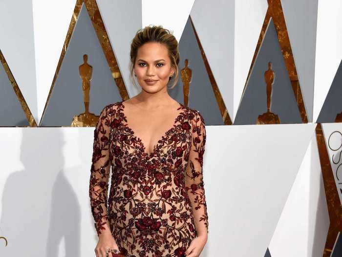 In 2016, Chrissy Teigen walked the Oscars red carpet in a floral maternity gown from Marchesa.