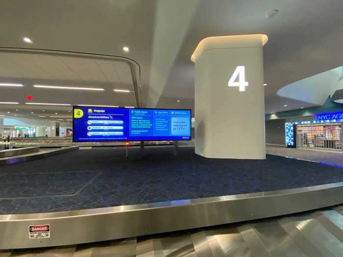 High-definition display signs show which flights each carousel is serving as well as ground transportation information and reminders about the pandemic.