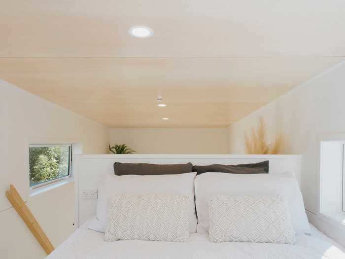 The bedroom — which can fit a king bed — is located upstairs.