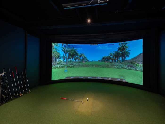 Jet setters can also practice their backswing in the golf simulator, featuring an artificial green that takes up an entire room on the terminal