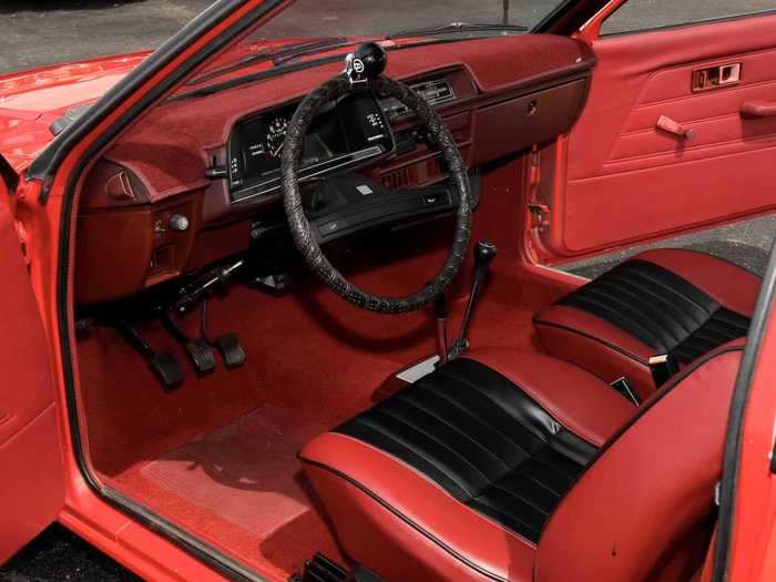 On one side, the interior is red with black trim ...