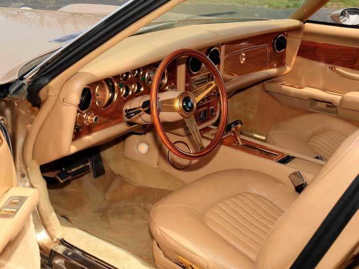 It also boasts a gold-trimmed interior with gold-faced instruments.