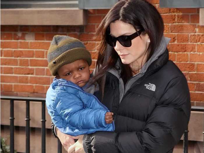 Sandra Bullock purchased a $14,000 Andy Warhol painting for her son Louis.