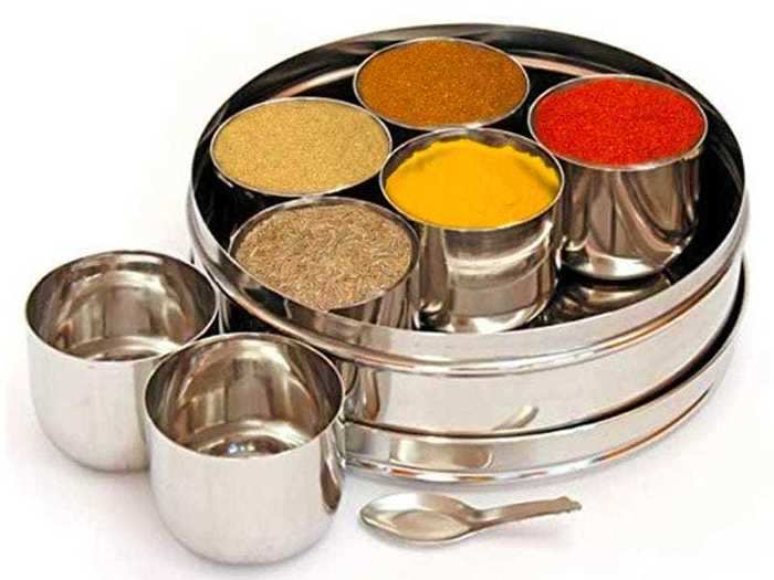 A stainless steel tin that stores spices and keeps them fresh