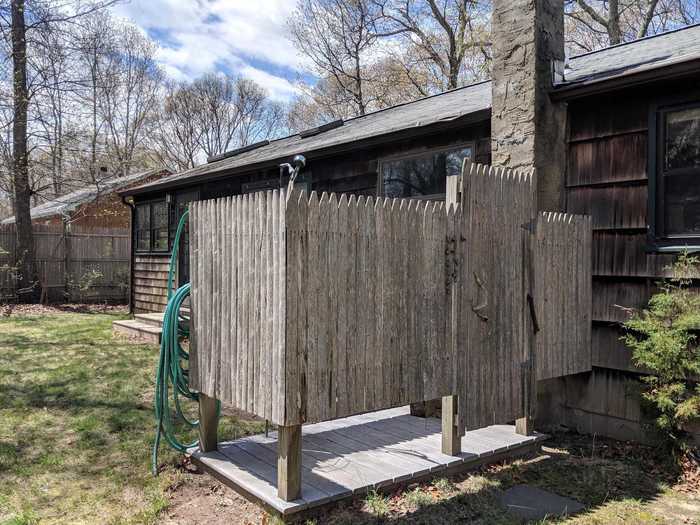 We love a good outdoor shower, but this one was rotting, unfortunately.