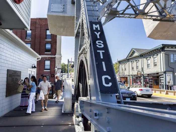 Mystic, Connecticut, features a charming drawbridge over the Mystic River in its Historic Downtown waterfront.