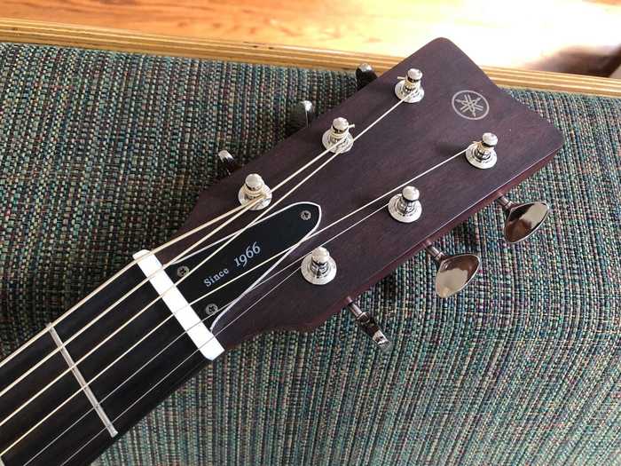 The headstock carries the Yamaha logo, and the truss-rod cover gets a "Since 1966" shout-out to the original Red Label, made-in-Japan guitars.