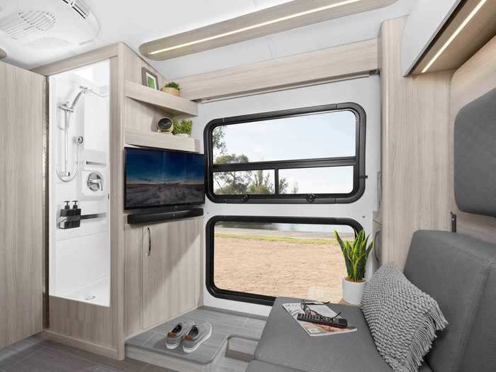 Parts of the windows can open for fresh air inside the tiny home when the ceiling fan or air conditioner aren