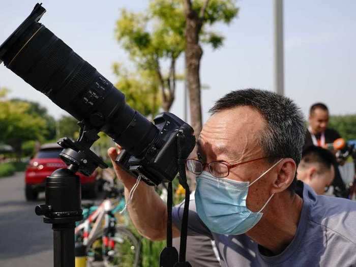 In China, people used zoom camera lenses in order to protect their eyes.