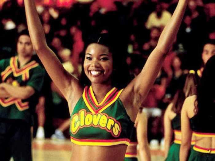 The following year, she appeared in another high school role as the head cheerleader of the East Compton Clovers in "Bring It On."