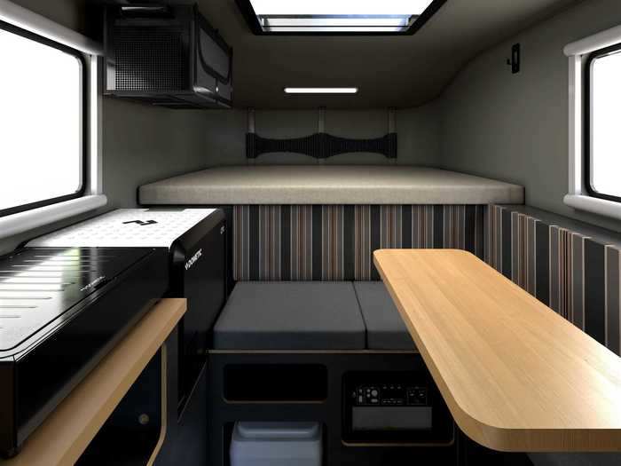 This allows the camper to sleep four people total: two on the “Convertible Lounge” and two on the bed.