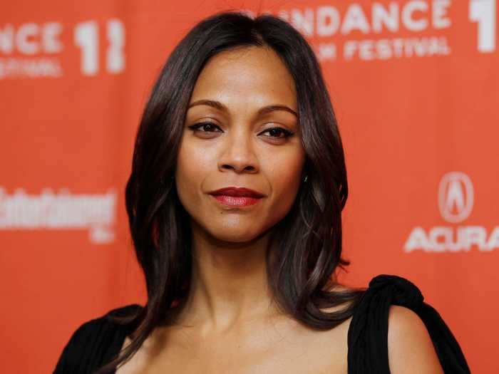 Zoe Saldana said she often feels "lonely" while filming because there are so few women on set.