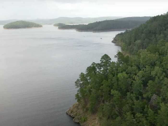 Broken Bow Lake in McCurtain County, Oklahoma, is completely surrounded by lush forests.