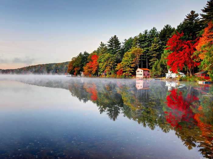 Lake Mattawa in Orange, Massachusetts, is home to year-round trout fishing as well as stunning New England fall foliage.