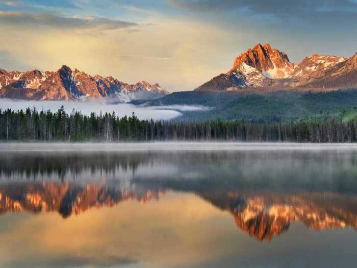 Redfish Lake near Stanley, Idaho, is located at the headwaters of the Salmon River and is best known for its sockeye salmon population.