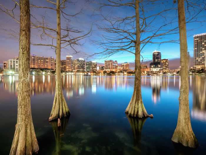 Lake Eola in Orlando, Florida, is a popular urban lake known for its swan-shaped paddle boats and wildlife.